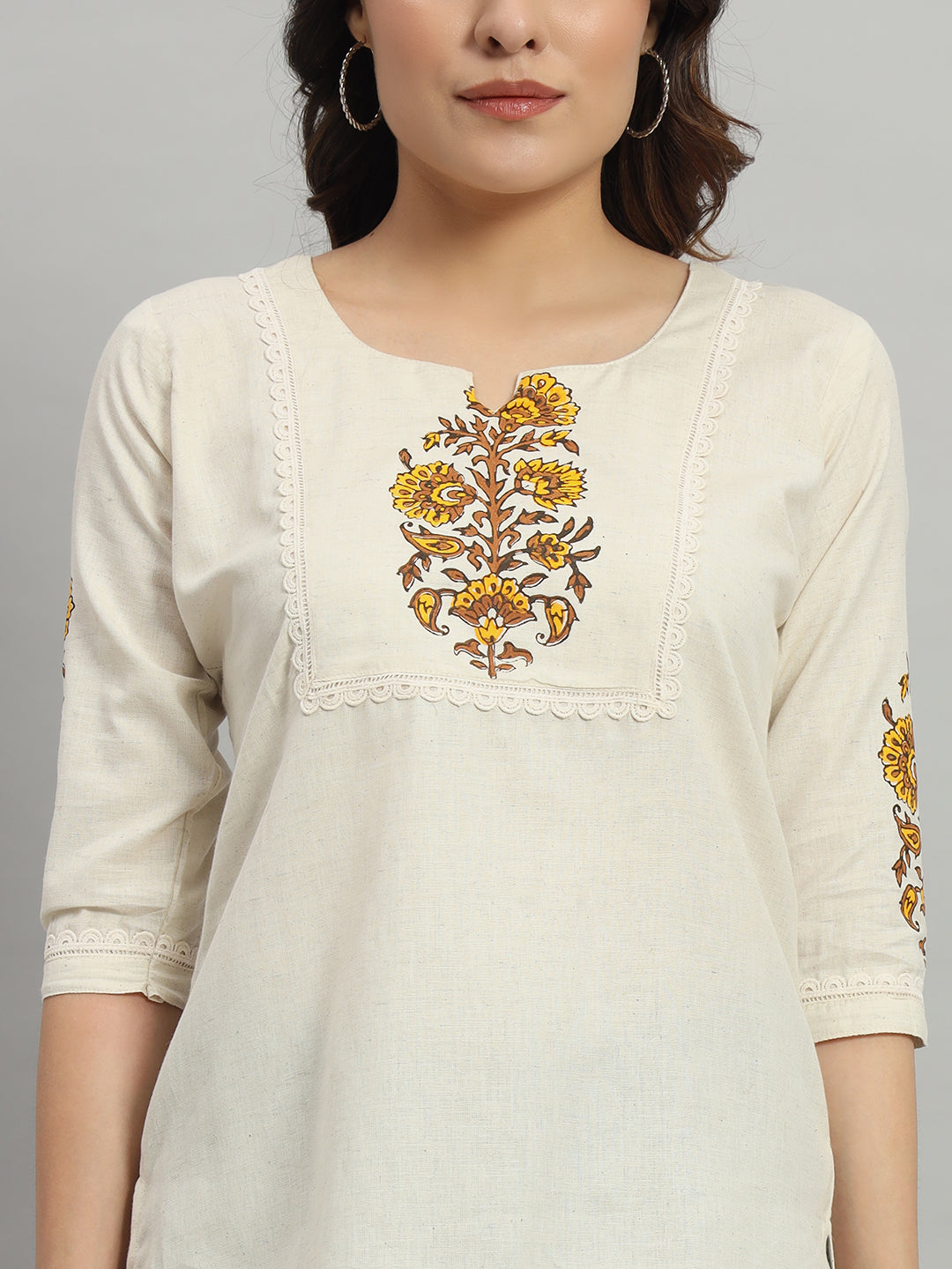 Cream short Kurti with Floral Design